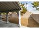 Covered patio and gravel backyard with block wall at 5934 Clear Valley Ave, Las Vegas, NV 89142