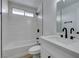 Simple bathroom with single vanity and tub at 5934 Clear Valley Ave, Las Vegas, NV 89142