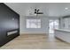 Living room with modern fireplace and ceiling fan at 5934 Clear Valley Ave, Las Vegas, NV 89142