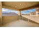 Covered balcony offers distant mountain views at 5969 Viscaya Grove St, Las Vegas, NV 89118