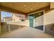 Covered balcony with sliding glass doors at 5969 Viscaya Grove St, Las Vegas, NV 89118