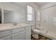 Clean bathroom, featuring a walk-in shower and modern vanity at 5969 Viscaya Grove St, Las Vegas, NV 89118