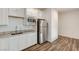 Small kitchenette with stainless steel appliances at 5969 Viscaya Grove St, Las Vegas, NV 89118