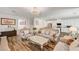 Elegant living room featuring ornate furniture and hardwood floors at 5969 Viscaya Grove St, Las Vegas, NV 89118