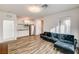 Living room with kitchenette and sectional sofa at 5969 Viscaya Grove St, Las Vegas, NV 89118