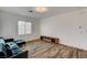 Living area with dark blue sectional sofa at 5969 Viscaya Grove St, Las Vegas, NV 89118