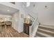 Bright entryway with hardwood floors and a carpeted staircase at 5969 Viscaya Grove St, Las Vegas, NV 89118