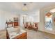 Bright sitting area with balcony access, featuring Asian-inspired furnishings at 5969 Viscaya Grove St, Las Vegas, NV 89118