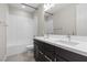 Elegant bathroom featuring double sinks and a bathtub at 6332 Ava Ridge Ave, Las Vegas, NV 89141