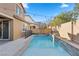 Beautiful pool and patio area with string lights at 6332 Ava Ridge Ave, Las Vegas, NV 89141