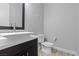 Modern powder room with a sleek sink and vanity at 6332 Ava Ridge Ave, Las Vegas, NV 89141