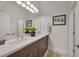 Double vanity bathroom with modern finishes and a clean design at 6434 Spring Jog St, Las Vegas, NV 89166