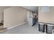 Modern kitchen island with gray cabinets and light gray flooring at 6461 Karlsen Ct, Las Vegas, NV 89122