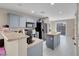 Modern kitchen with gray cabinets and an island at 6461 Karlsen Ct, Las Vegas, NV 89122