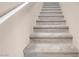 Carpeted staircase with a white handrail at 6461 Karlsen Ct, Las Vegas, NV 89122