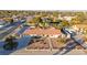 Single story home with landscaped yard and large driveway, aerial view at 6480 Darby Ave, Las Vegas, NV 89146