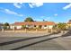 Single story home with landscaped yard and gated entrance at 6480 Darby Ave, Las Vegas, NV 89146