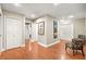 Hallway with wood floors and built-in shelving at 6480 Darby Ave, Las Vegas, NV 89146