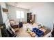 Bedroom with window, bookcase, and unpacked boxes at 6770 Laronda Ln, Las Vegas, NV 89156