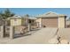 Single-story house with attached garage and paved driveway at 6770 Laronda Ln, Las Vegas, NV 89156