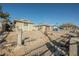 Front yard with flagstone pathway and mature trees at 6770 Laronda Ln, Las Vegas, NV 89156