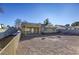 Large backyard with gravel and a covered patio at 6812 Greydawn Dr, Las Vegas, NV 89108