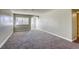 Spacious bedroom with neutral walls and carpet flooring at 6812 Greydawn Dr, Las Vegas, NV 89108