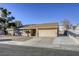 Single story home with attached garage and landscaped front yard at 6812 Greydawn Dr, Las Vegas, NV 89108