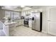 Kitchen features granite countertops and stainless steel appliances at 6812 Greydawn Dr, Las Vegas, NV 89108