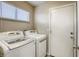 Laundry room with washer and dryer included at 6812 Greydawn Dr, Las Vegas, NV 89108