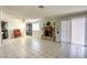 Living room with fireplace and tile floors at 6812 Greydawn Dr, Las Vegas, NV 89108