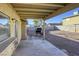 Covered patio with a built-in grill and seating area at 6812 Greydawn Dr, Las Vegas, NV 89108