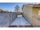 Side yard access with a concrete pathway and gate at 6812 Greydawn Dr, Las Vegas, NV 89108