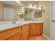 Bathroom with double vanity and large mirror at 716 Amber Hills Dr, Las Vegas, NV 89123