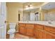 Bathroom with double vanity, shower, and tile floors at 716 Amber Hills Dr, Las Vegas, NV 89123