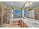 Elegant bathroom with double vanity, soaking tub, and shower at 716 Amber Hills Dr, Las Vegas, NV 89123