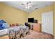 Bedroom with double bed, dresser, and ceiling fan at 716 Amber Hills Dr, Las Vegas, NV 89123