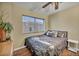 Spacious bedroom with large bed, dresser, and window at 716 Amber Hills Dr, Las Vegas, NV 89123