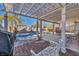 Spacious covered patio with pergola, perfect for outdoor dining and relaxation at 716 Amber Hills Dr, Las Vegas, NV 89123