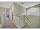 Upstairs hallway with carpet and access to bedrooms at 716 Amber Hills Dr, Las Vegas, NV 89123