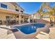 Enjoy this large pool and spacious patio area at 716 Amber Hills Dr, Las Vegas, NV 89123