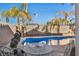 Relaxing poolside patio with table and chairs, overlooking the refreshing pool at 716 Amber Hills Dr, Las Vegas, NV 89123