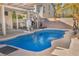 Enjoy this refreshing pool and relaxing patio area, perfect for entertaining at 716 Amber Hills Dr, Las Vegas, NV 89123