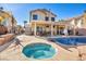 Escape to your own private oasis with this pool and spa at 716 Amber Hills Dr, Las Vegas, NV 89123