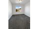 Simple bedroom with grey carpet and a window with mountain view at 7355 Sunray Point St, North Las Vegas, NV 89084