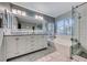 Elegant bathroom with double vanity and large shower at 8125 Caramel Gorge Ct, Las Vegas, NV 89143