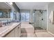 Elegant bathroom with soaking tub, walk-in shower, and modern vanity at 8125 Caramel Gorge Ct, Las Vegas, NV 89143