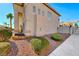 Two-story house with desert landscaping and gated entry at 8125 Caramel Gorge Ct, Las Vegas, NV 89143