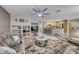 Spacious living room featuring a built-in entertainment center and comfortable seating at 8125 Caramel Gorge Ct, Las Vegas, NV 89143