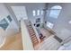 Two-story living room with fireplace and high ceilings at 8125 Caramel Gorge Ct, Las Vegas, NV 89143